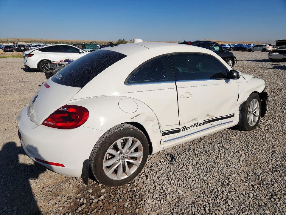 Фото 3 с аукциона – 2014 VOLKSWAGEN BEETLE с VIN 3VWJL7AT6EM615201