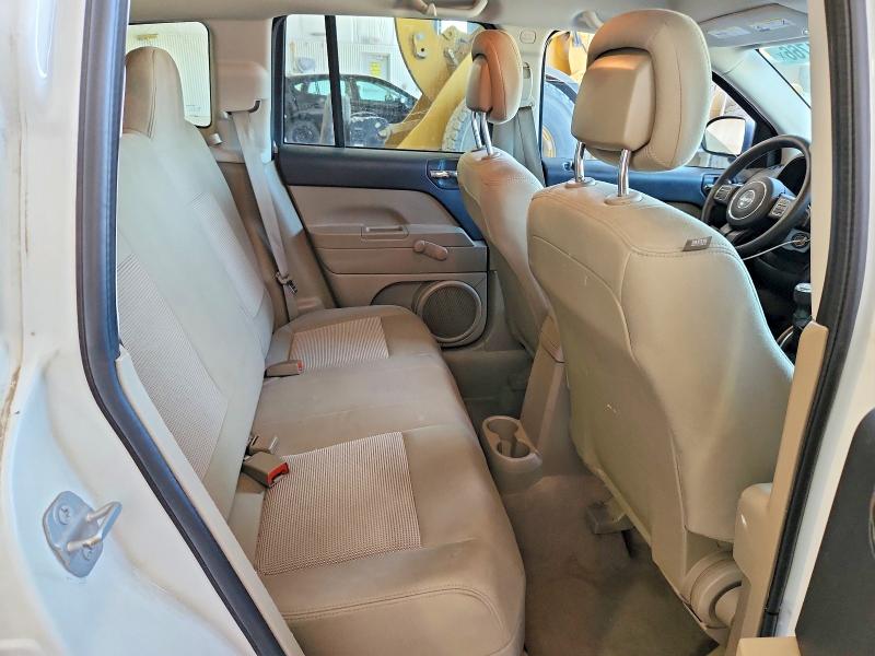 Photo 11 from auction – 2014 JEEP COMPASS with VIN 1C4NJCBA8ED790223