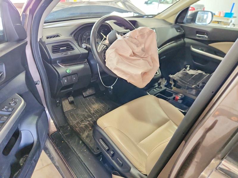 Photo 8 from auction – 2015 HONDA CR-V with VIN 2HKRM3H78FH500126