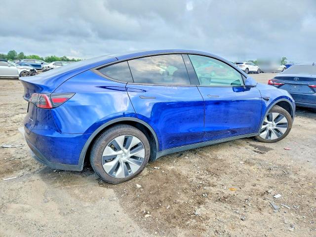 Photo 3 from auction – 2023 TESLA MODEL Y with VIN 7SAYGAEE4PF879140