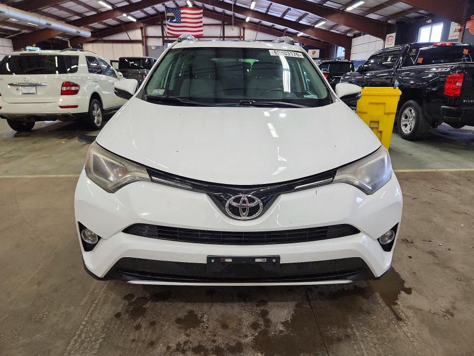 Photo 5 from auction – 2016 TOYOTA RAV4 with VIN 2T3RFREV0GW481310