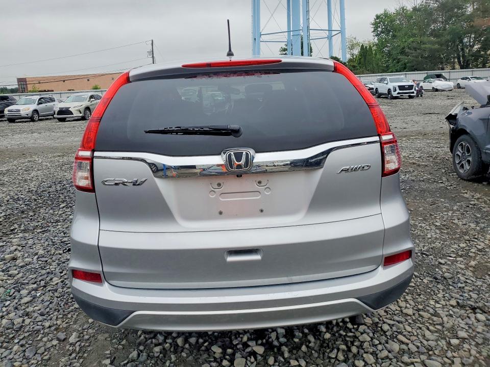 Photo 6 from auction – 2015 HONDA CR-V with VIN 5J6RM4H55FL054818