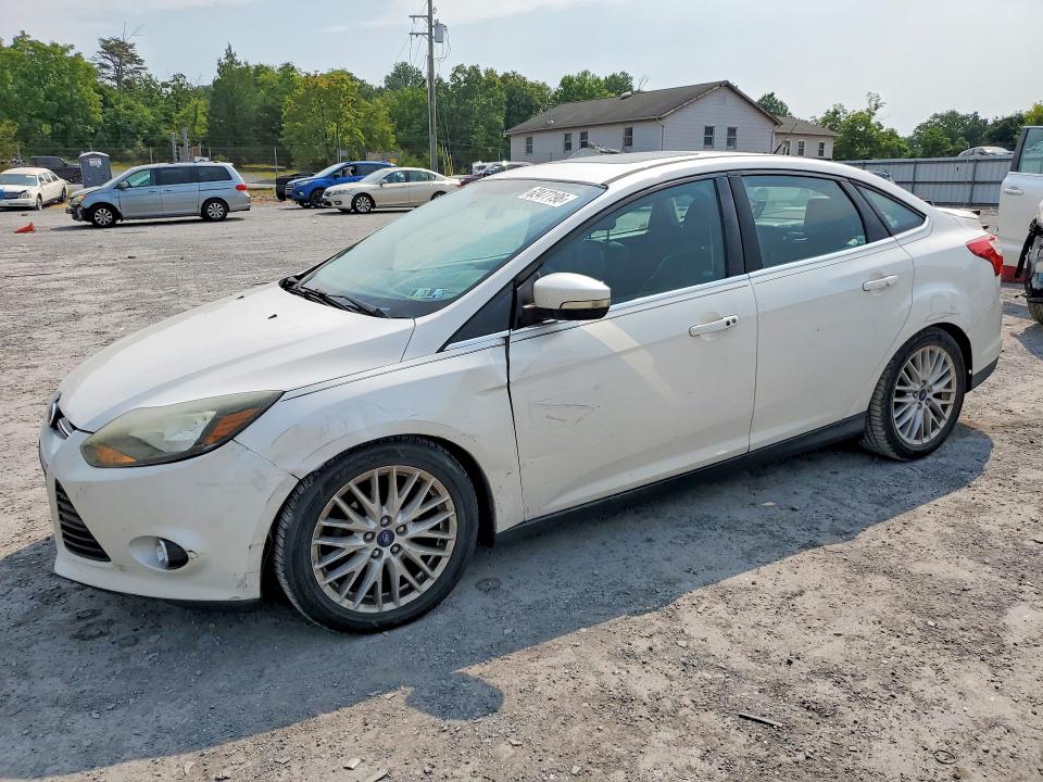 FORD FOCUS 2014 with VIN 1FADP3J21EL416231 - Photo from auction