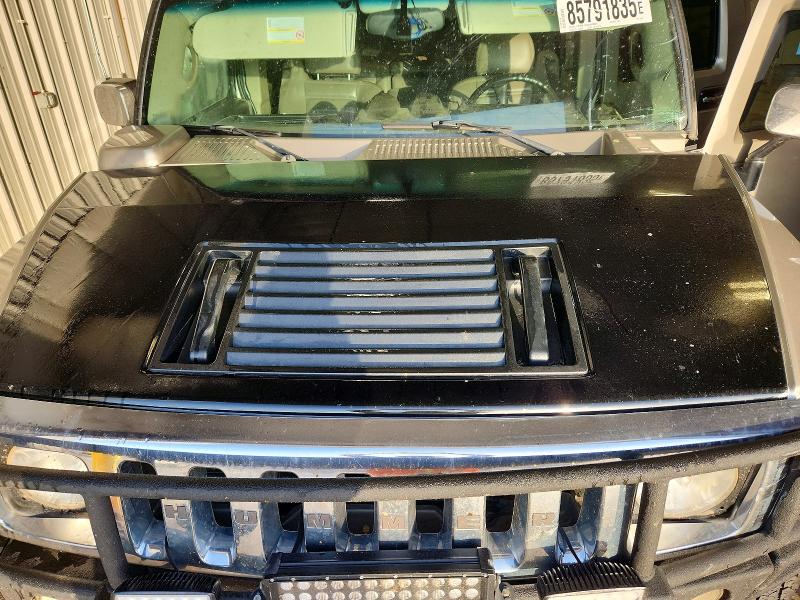 Photo 12 from auction – 2003 HUMMER H2 with VIN 5GRGN23UX3H109600
