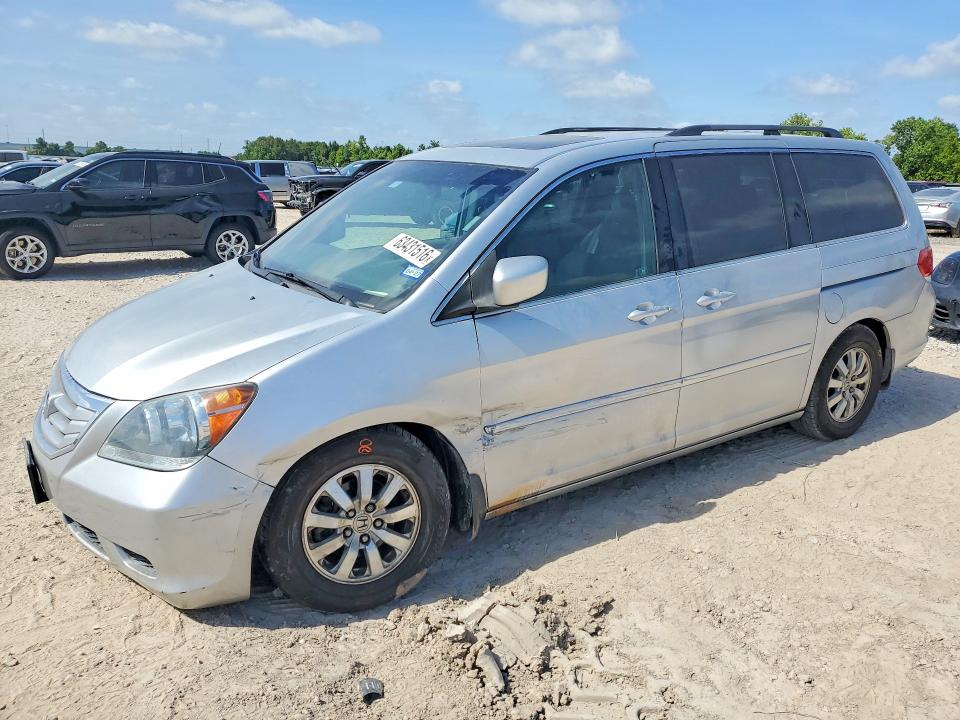 HONDA ODYSSEY 2010 with VIN 5FNRL3H6XAB050240 - Photo from auction