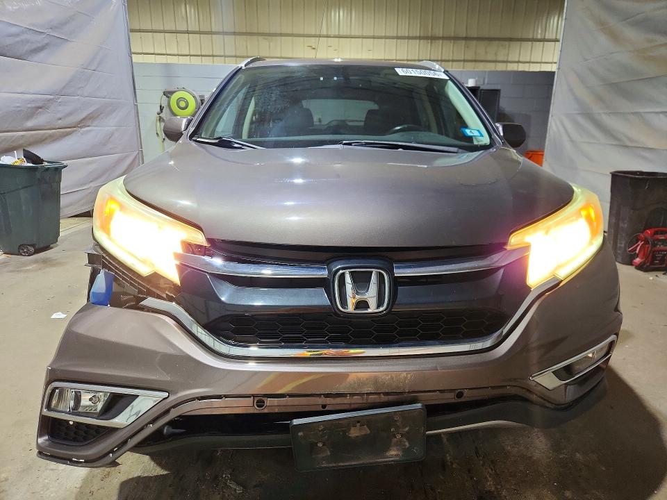 Photo 5 from auction – 2015 HONDA CR-V with VIN 2HKRM4H72FH635835