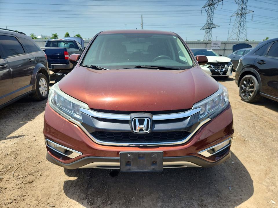 Photo 5 from auction – 2015 HONDA CR-V with VIN 5J6RM4H55FL042894
