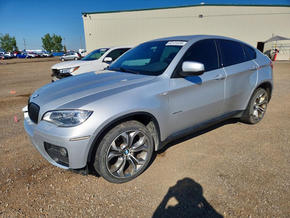 BMW X6 2013 with VIN 5UXFG2C58DL786867 - Photo from auction