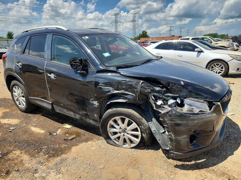 Photo 4 from auction – 2014 MAZDA CX-5 with VIN JM3KE4CY4E0353214