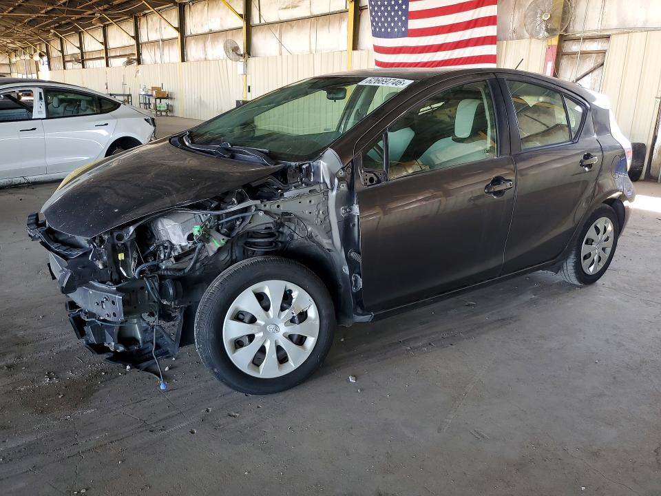 TOYOTA PRIUS C 2012 с VIN JTDKDTB37C1523939 - Снимка от търг