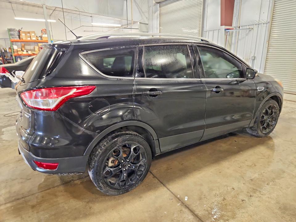 Photo 3 from auction – 2014 FORD ESCAPE with VIN 1FMCU9J99EUE10519