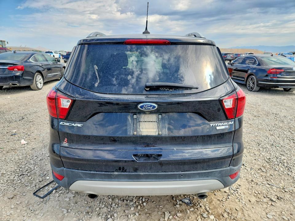 Photo 6 from auction – 2019 FORD ESCAPE with VIN 1FMCU9J99KUC32381