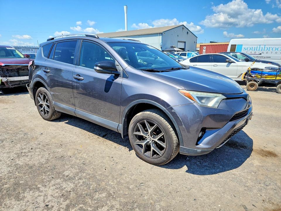 Photo 4 from auction – 2017 TOYOTA RAV4 with VIN 2T3JFREV9HW627959