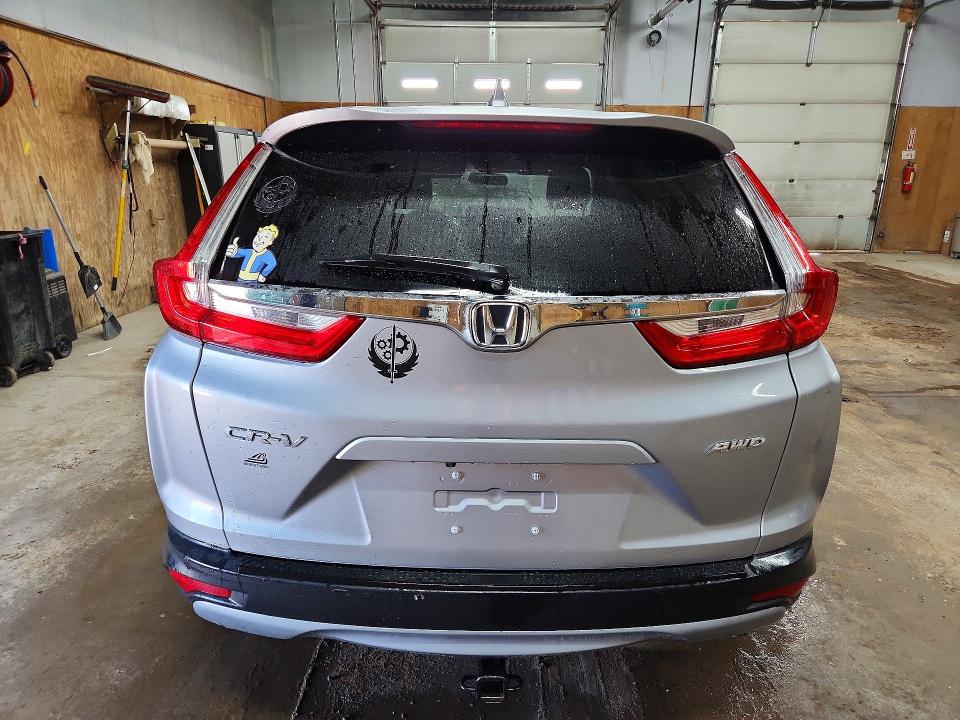 Photo 6 from auction – 2018 HONDA CR-V with VIN 7FARW2H51JE089649