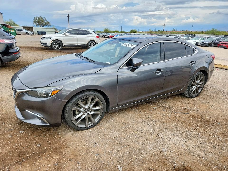 MAZDA 6 2017 with VIN JM1GL1W54H1142565 - Photo from auction
