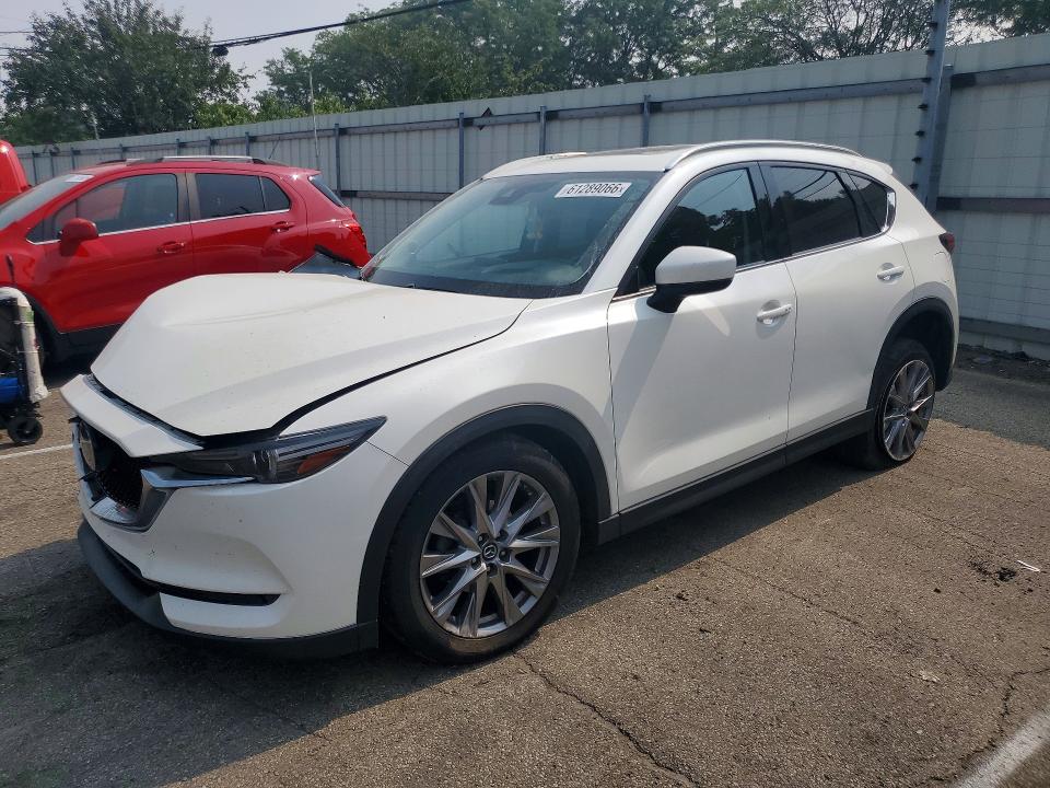 MAZDA CX-5 2020 with VIN JM3KFBDMXL1802934 - Photo from auction
