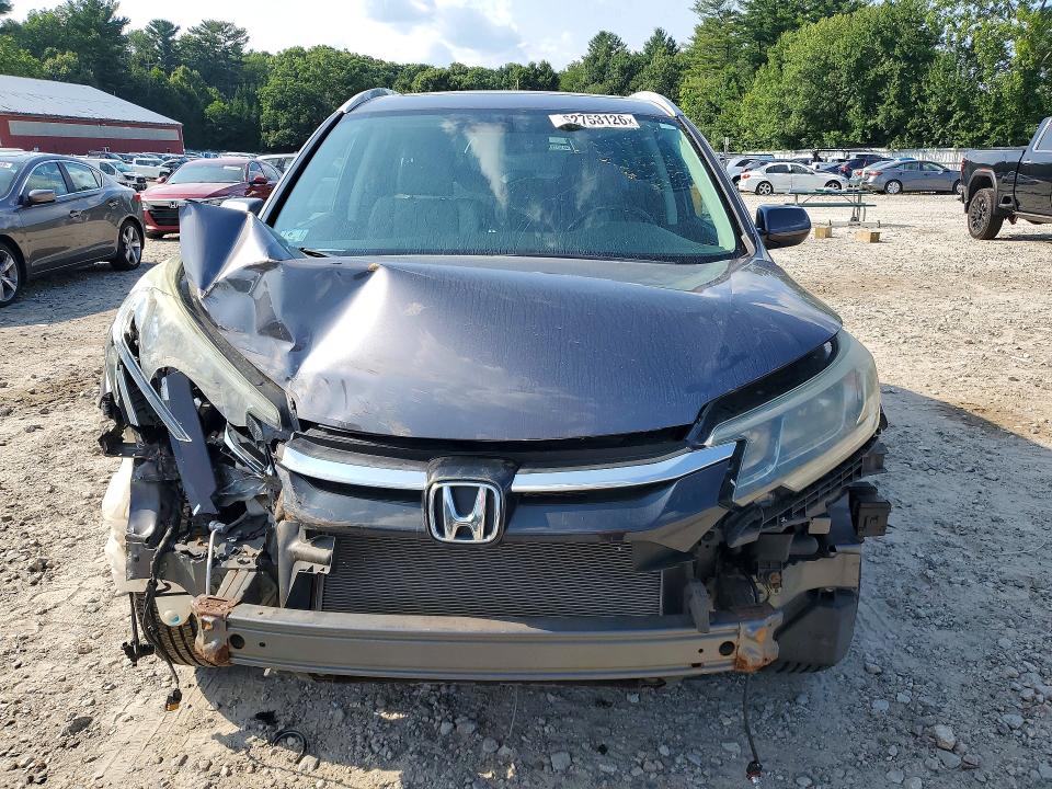 Photo 5 from auction – 2015 HONDA CR-V with VIN 2HKRM4H76FH612123