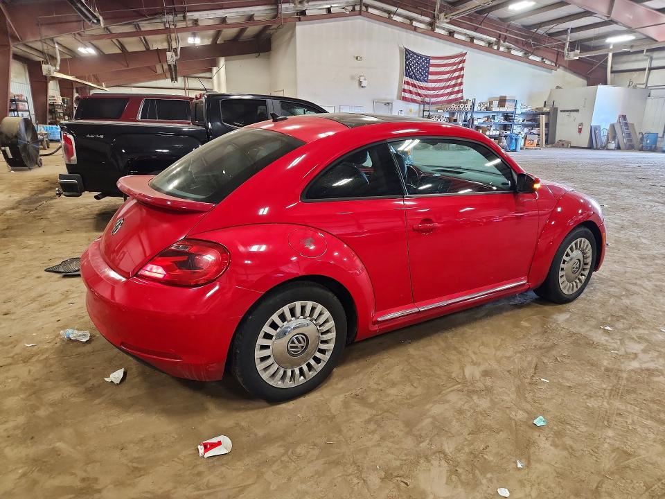 Photo 3 from auction – 2014 VOLKSWAGEN BEETLE with VIN 3VWJX7AT5EM631295