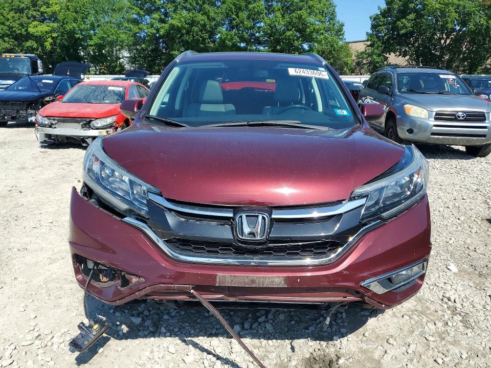 Photo 5 from auction – 2015 HONDA CR-V with VIN 2HKRM4H70FH616636
