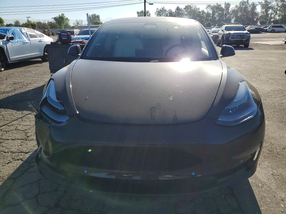 Photo 5 from auction – 2022 TESLA MODEL 3 with VIN 5YJ3E1EB8NF198768