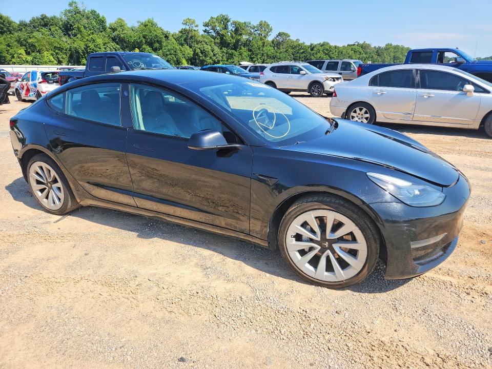 Photo 4 from auction – 2023 TESLA MODEL 3 with VIN 5YJ3E1EAXPF554700