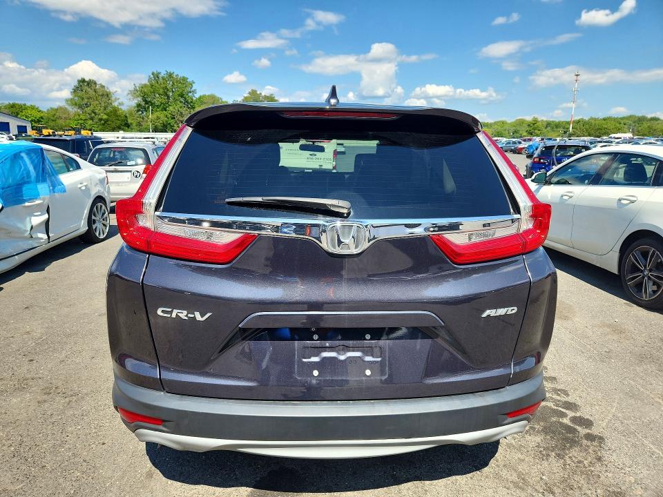 Photo 6 from auction – 2017 HONDA CR-V with VIN 2HKRW2H55HH672362