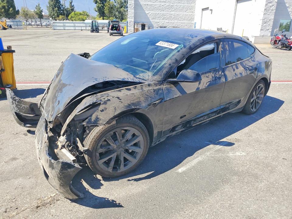TESLA MODEL 3 2023 с VIN 5YJ3E1EA0PF591335 - Снимка от търг
