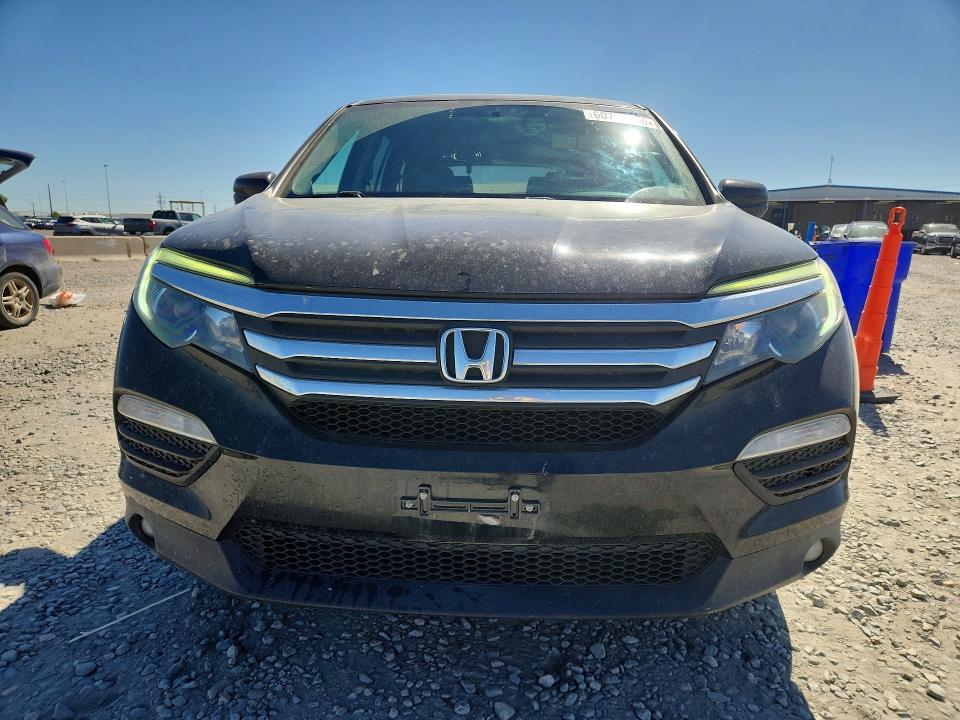 Photo 5 from auction – 2018 HONDA PILOT with VIN 5FNYF6H56JB036332