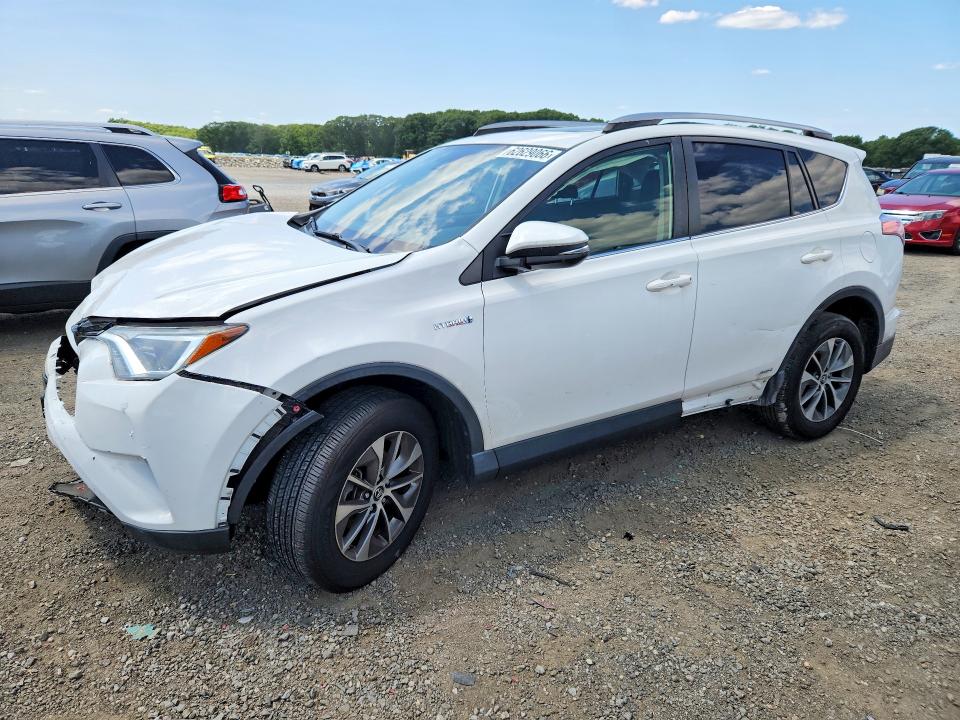 TOYOTA RAV4 HYBRID 2018 с VIN JTMRJREV6JD248910 - Снимка от търг