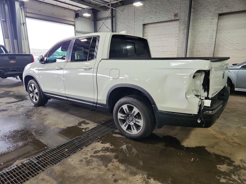 Photo 2 from auction – 2019 HONDA RIDGELINE with VIN 5FPYK3F58KB013947