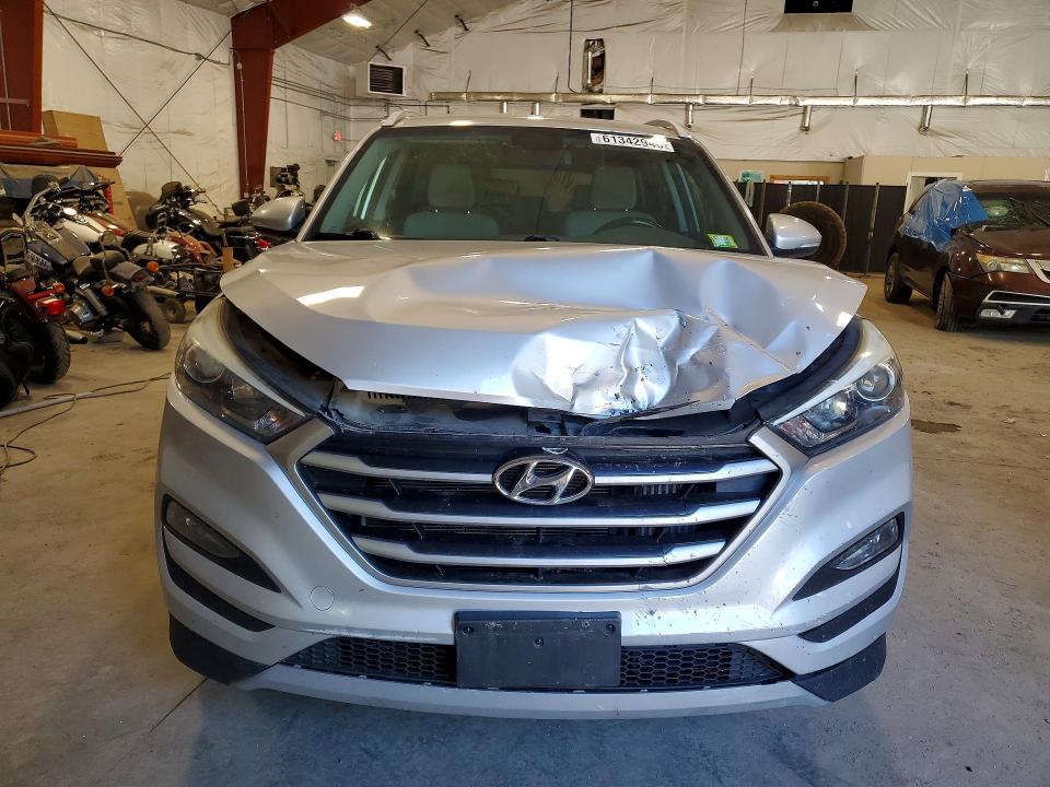 Photo 5 from auction – 2017 HYUNDAI TUCSON with VIN KM8J3CA27HU515736