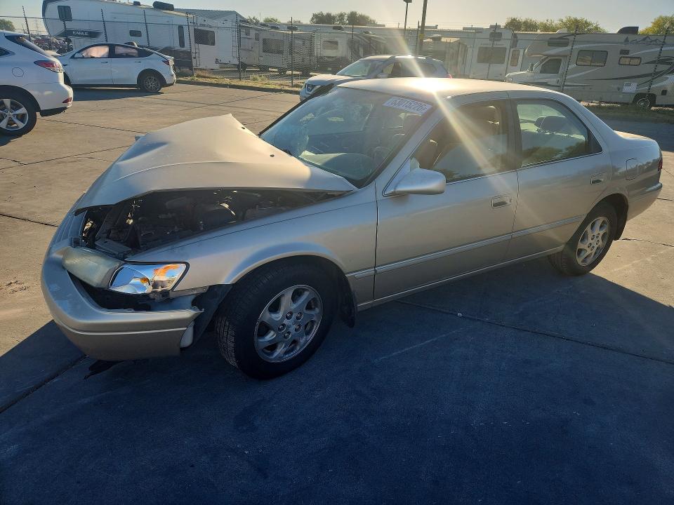 TOYOTA CAMRY 1998 with VIN JT2BF22K7W0117710 - Photo from auction
