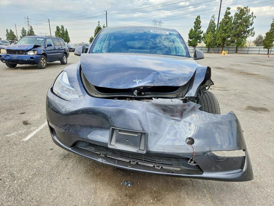 Photo 5 from auction – 2024 TESLA MODEL Y with VIN 7SAYGDEE2RF064620