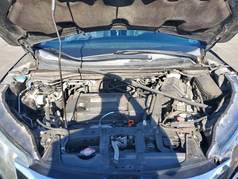Photo 11 from auction – 2015 HONDA CR-V with VIN 5J6RM4H39FL074990