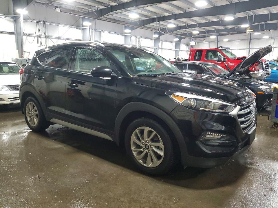 Photo 4 from auction – 2017 HYUNDAI TUCSON with VIN KM8J3CA41HU524577