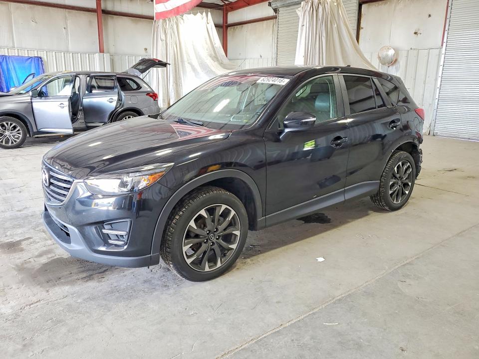MAZDA CX-5 2016 con VIN JM3KE4DY7G0706093 - Foto de la subasta