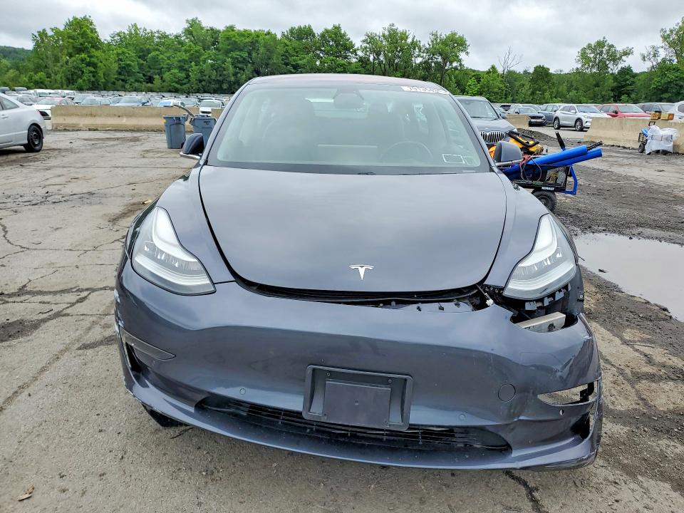 Photo 5 from auction – 2018 TESLA MODEL 3 with VIN 5YJ3E1EA5JF101995