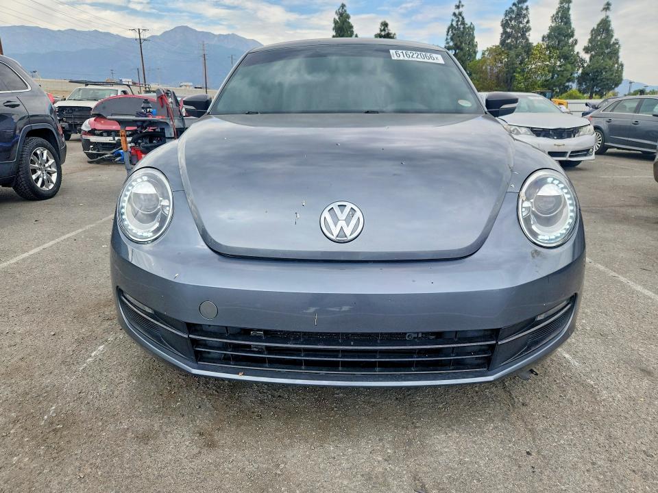 Photo 5 from auction – 2012 VOLKSWAGEN BEETLE with VIN 3VWJP7AT0CM629676