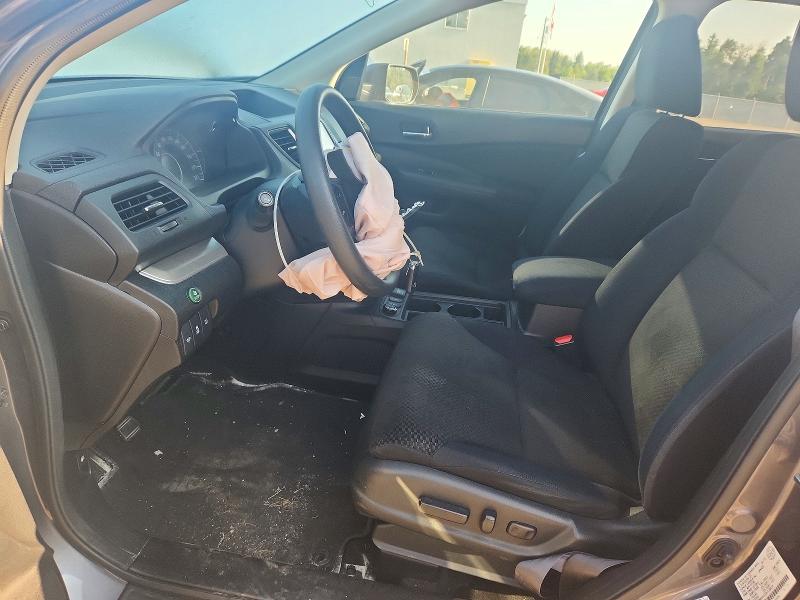 Photo 7 from auction – 2016 HONDA CR-V with VIN 2HKRM4H57GH128624