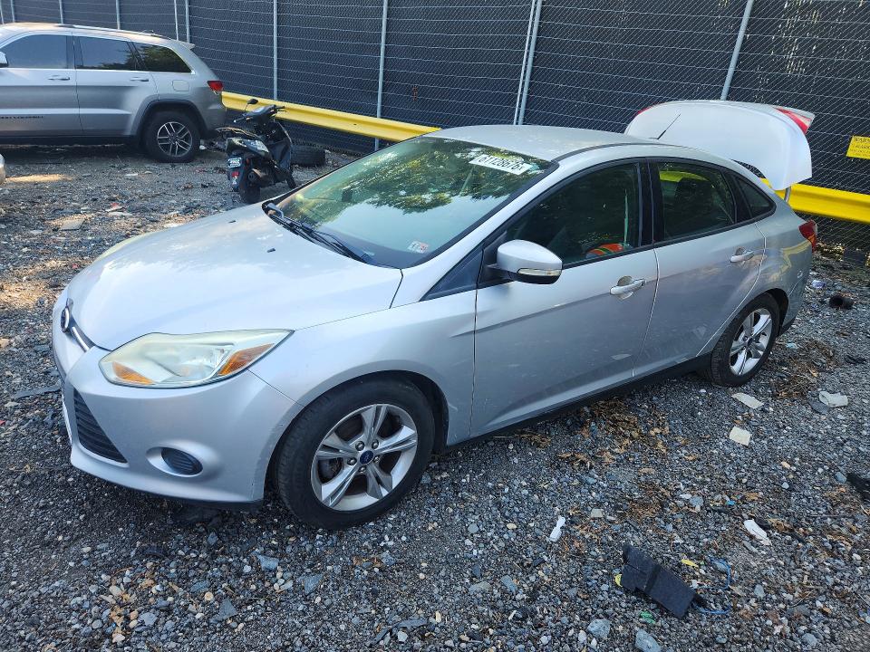 FORD FOCUS 2014 with VIN 1FADP3F20EL259817 - Photo from auction