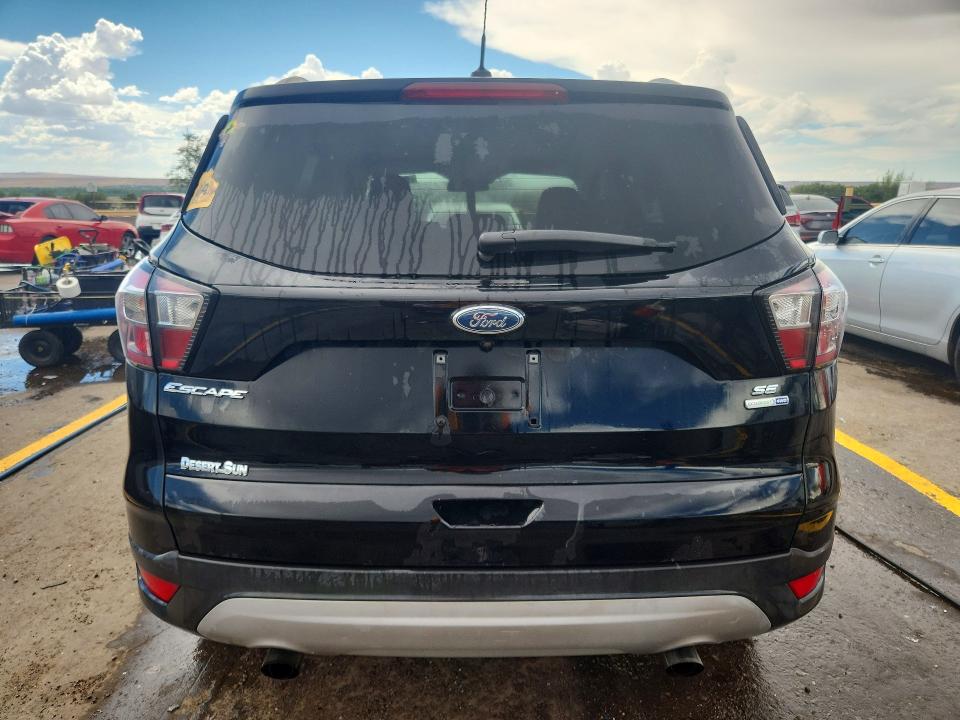Photo 6 from auction – 2018 FORD ESCAPE with VIN 1FMCU9GD2JUA32064