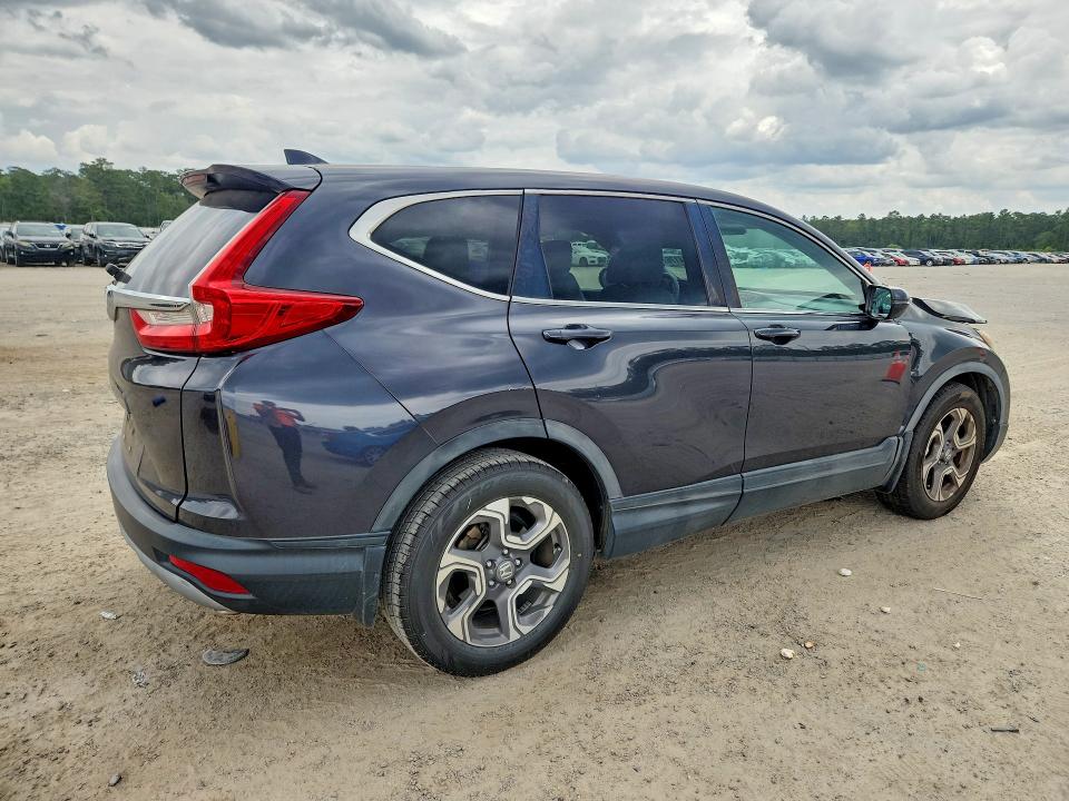 Photo 3 from auction – 2018 HONDA CR-V with VIN 7FARW1H83JE036939