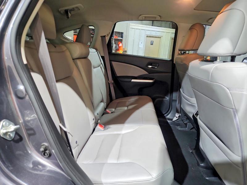 Photo 11 from auction – 2016 HONDA CR-V with VIN 2HKRM3H70GH503071