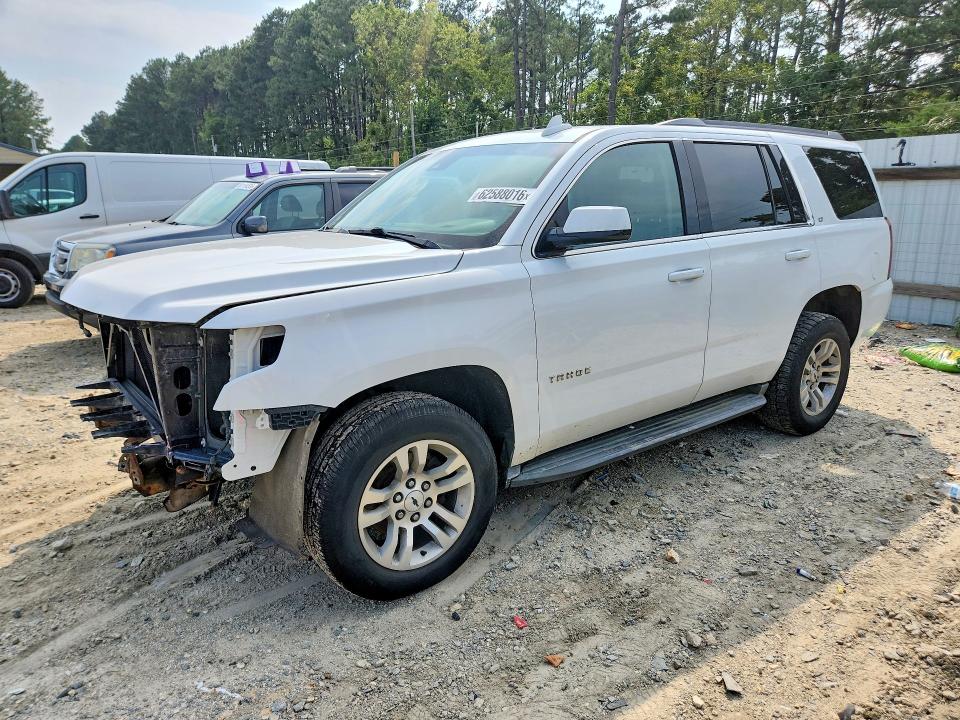 CHEVROLET TAHOE 2019 with VIN 1GNSKBKC9KR396232 - Photo from auction