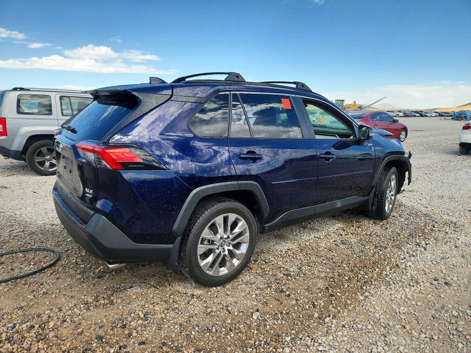 Photo 3 from auction – 2021 TOYOTA RAV4 with VIN JTMA1RFV9MD073293