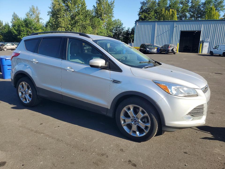 Photo 4 from auction – 2015 FORD ESCAPE with VIN 1FMCU9G99FUA52931