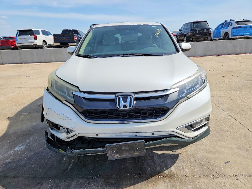 Photo 5 from auction – 2016 HONDA CR-V with VIN 5J6RM4H51GL126227