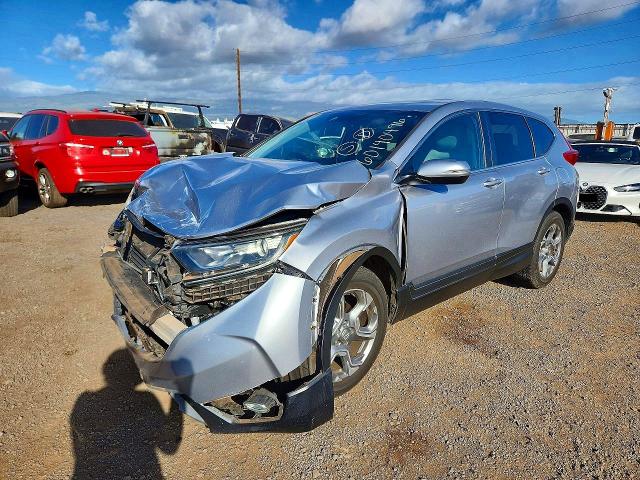 Photo 1 from auction – 2018 HONDA CR-V with VIN 7FARW1H55JE039749