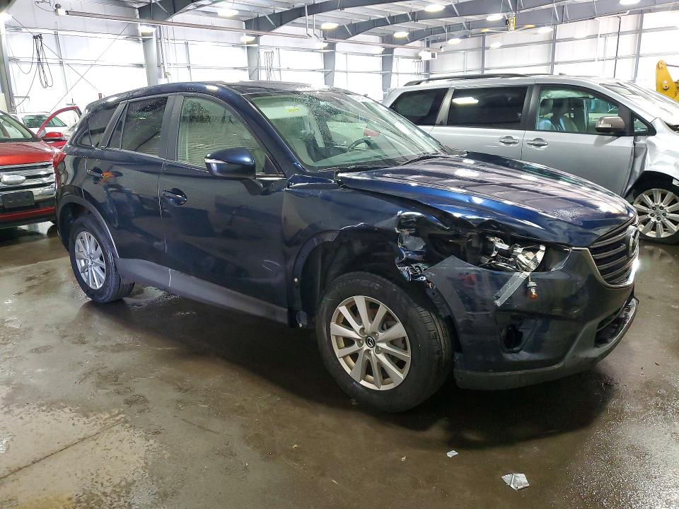 Photo 4 from auction – 2016 MAZDA CX-5 with VIN JM3KE4CYXG0602649