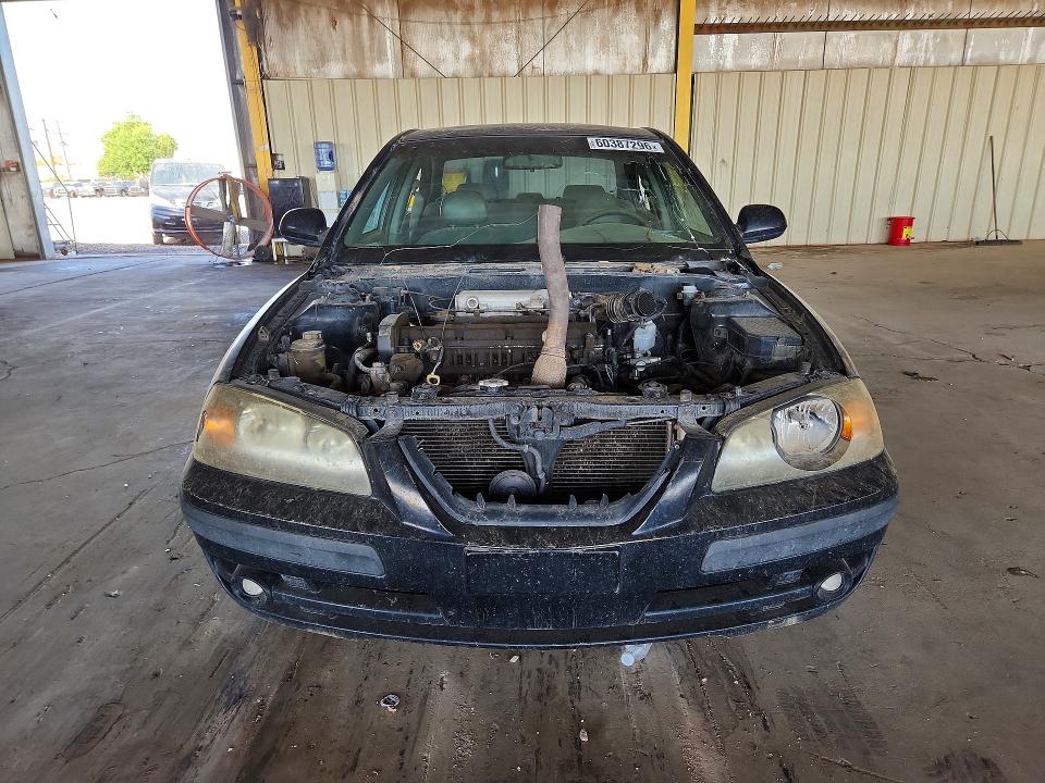 Снимка 5 от търг – 2004 HYUNDAI ELANTRA с VIN KMHDN46D84U916245